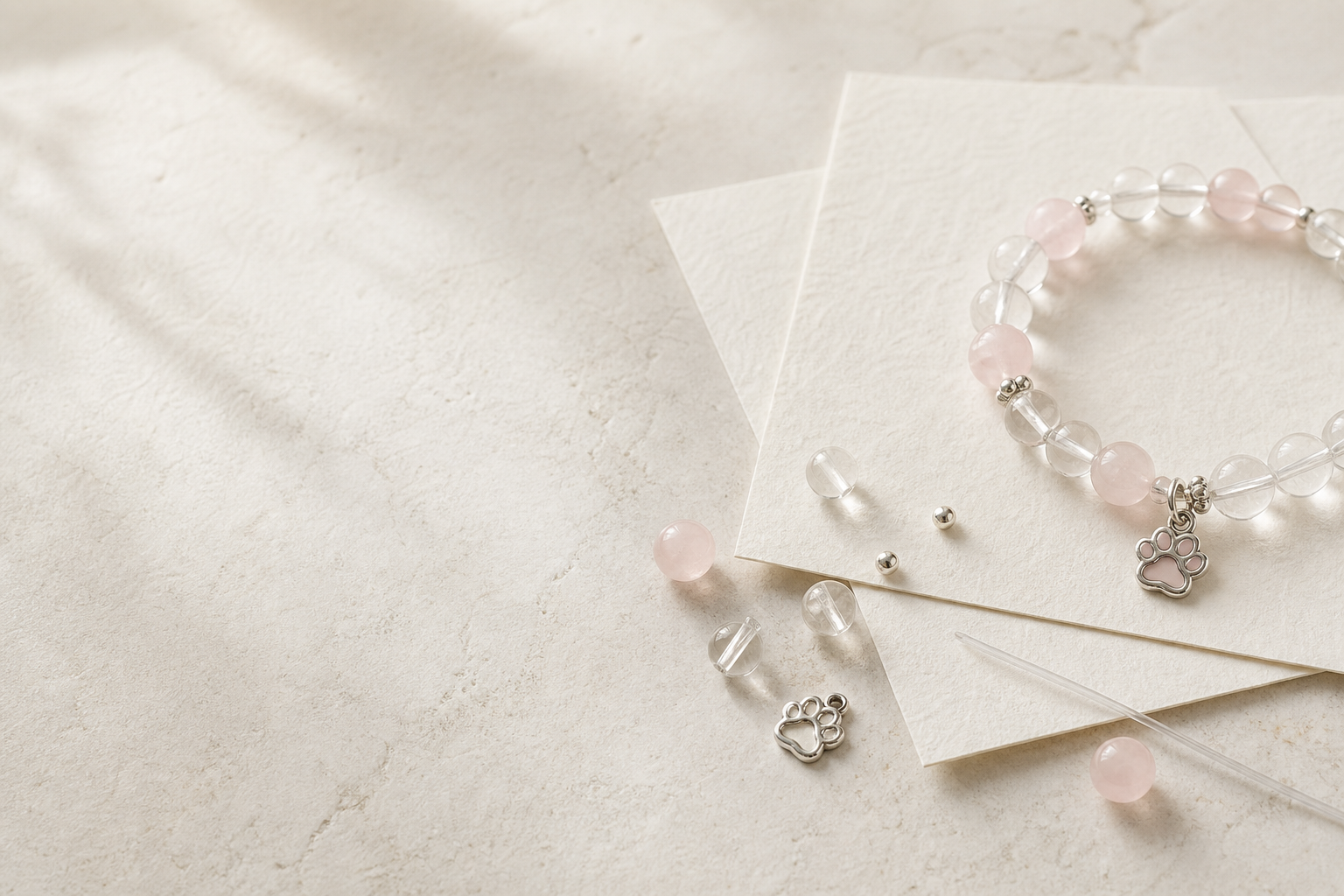 A completed crystal bracelet arranged with loose crystal beads
